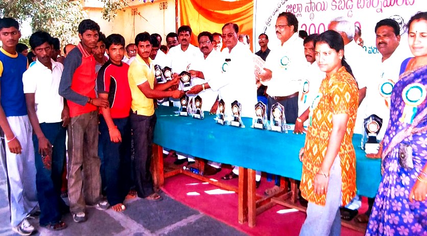 Prize distribution at a district youth sports tournament