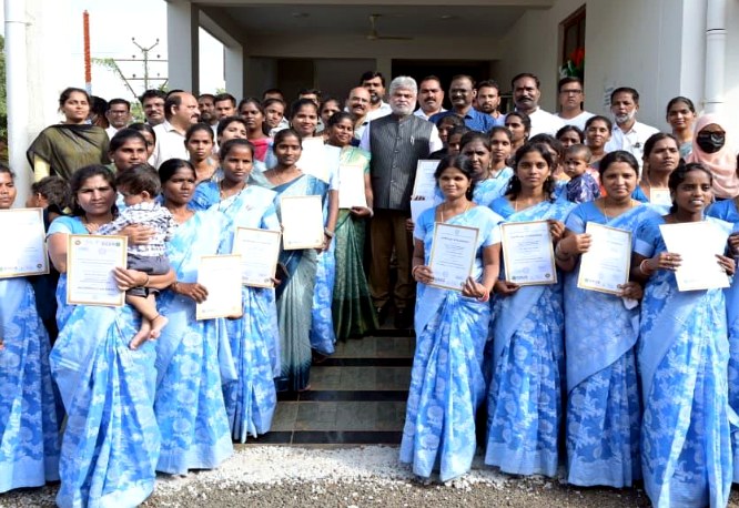 Women receiving skill-training completion certificates